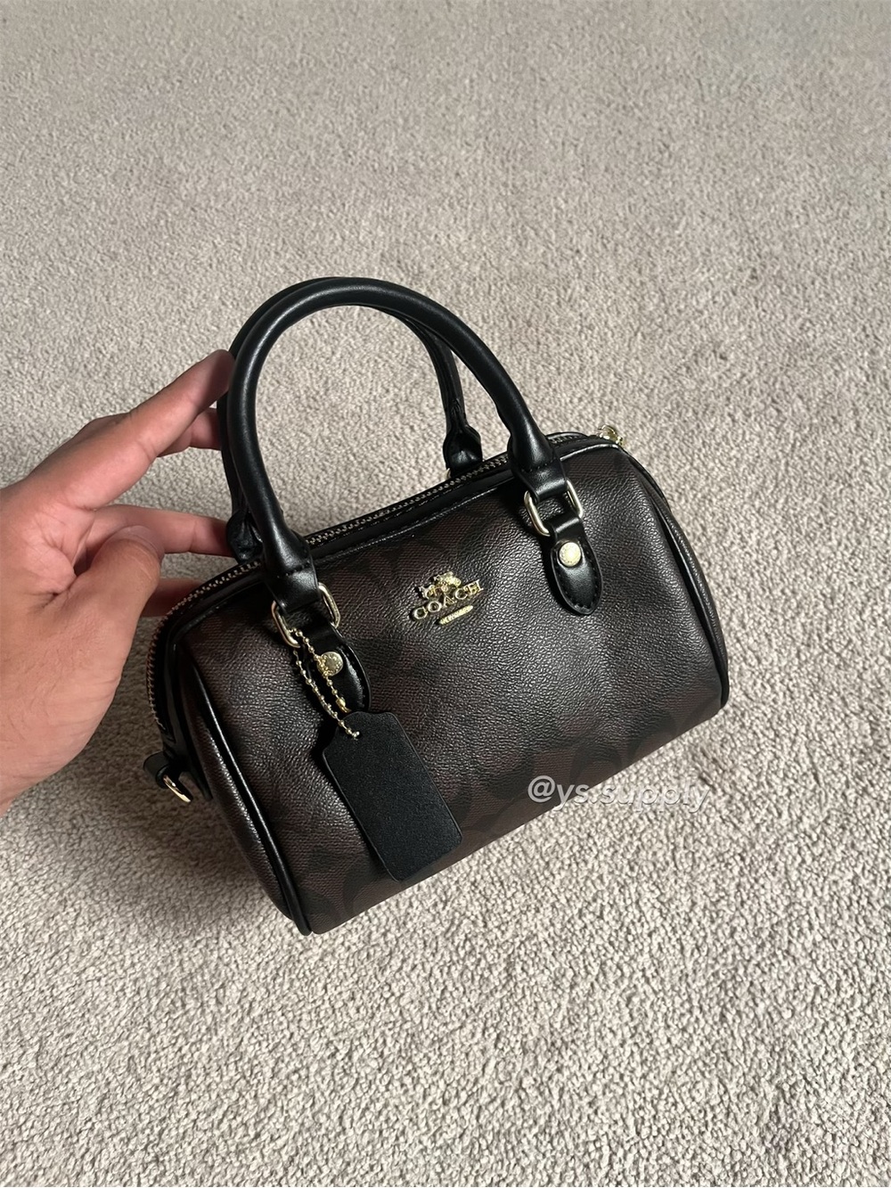 Coach mini rowan handbag with shoulder strap in ‘Signature Leather’